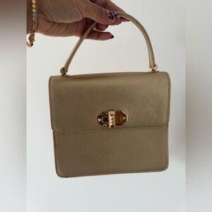 Elegant Beige Handbag with Gold Accents